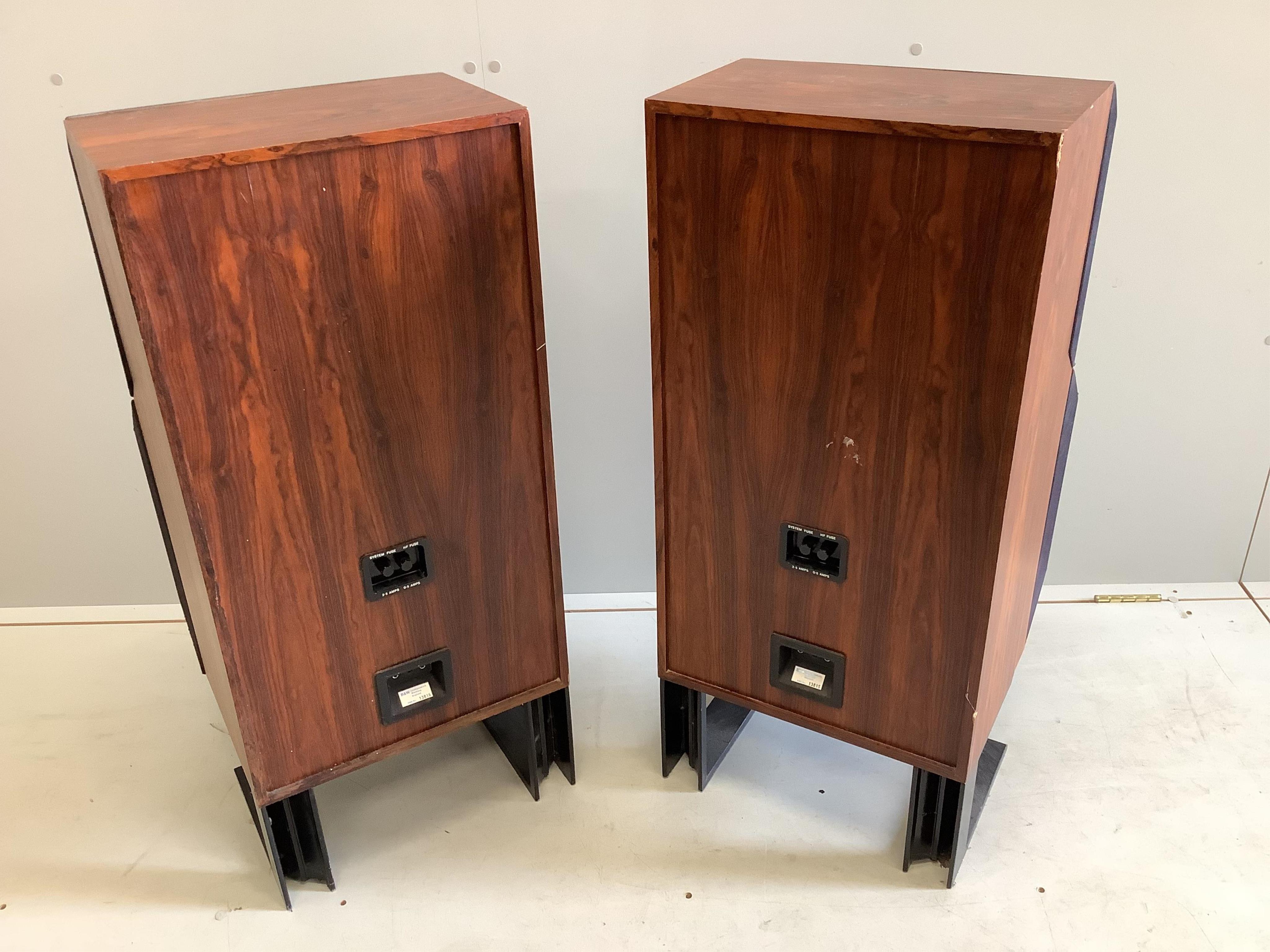 A pair of 1970s Bower & Wilkins DM6 ‘Pregnant penguin’ faux rosewood floor standing speakers, 93cm high